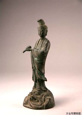 铜滴水观音立像