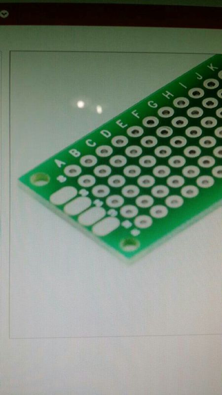 这是一个双面喷锡板,我想知道它头上那四个椭